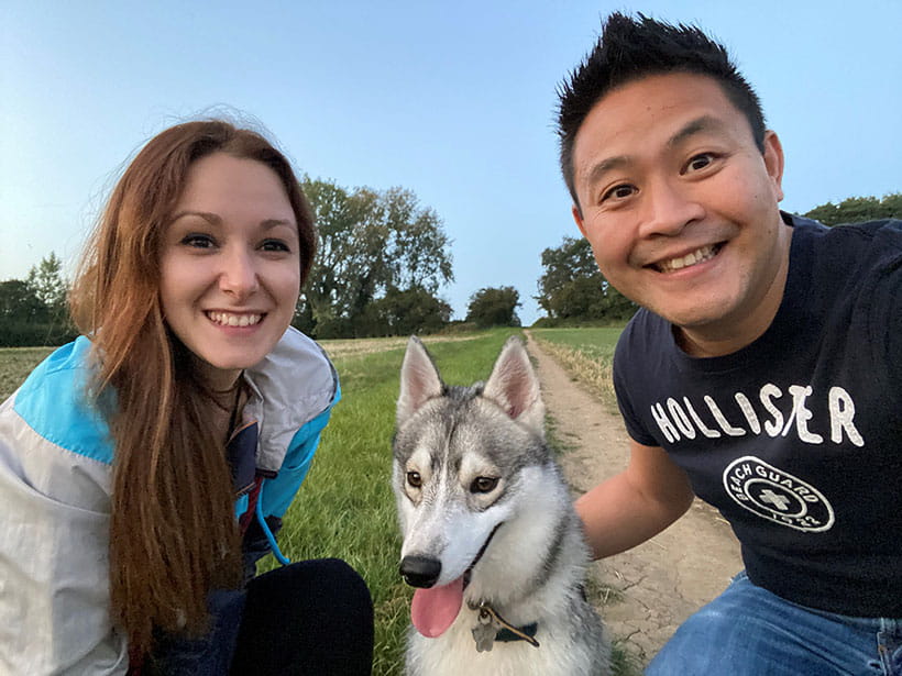 Kai with wife and dog in park